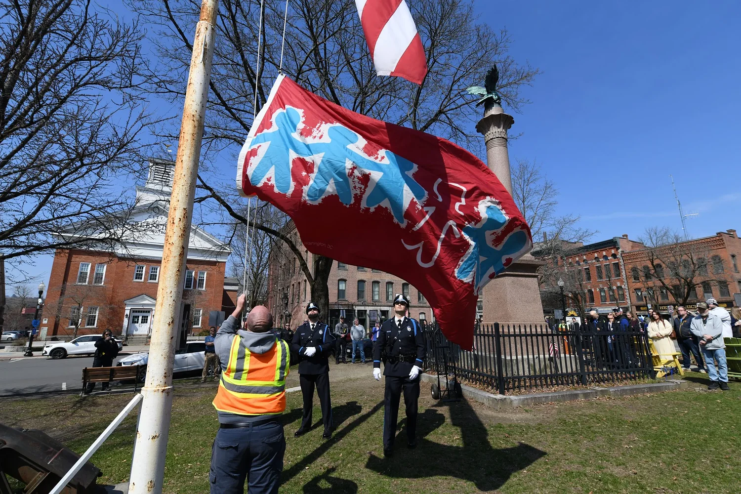'It's a very real issue': Flag-raising ceremony marks Child Abuse Prevention Month