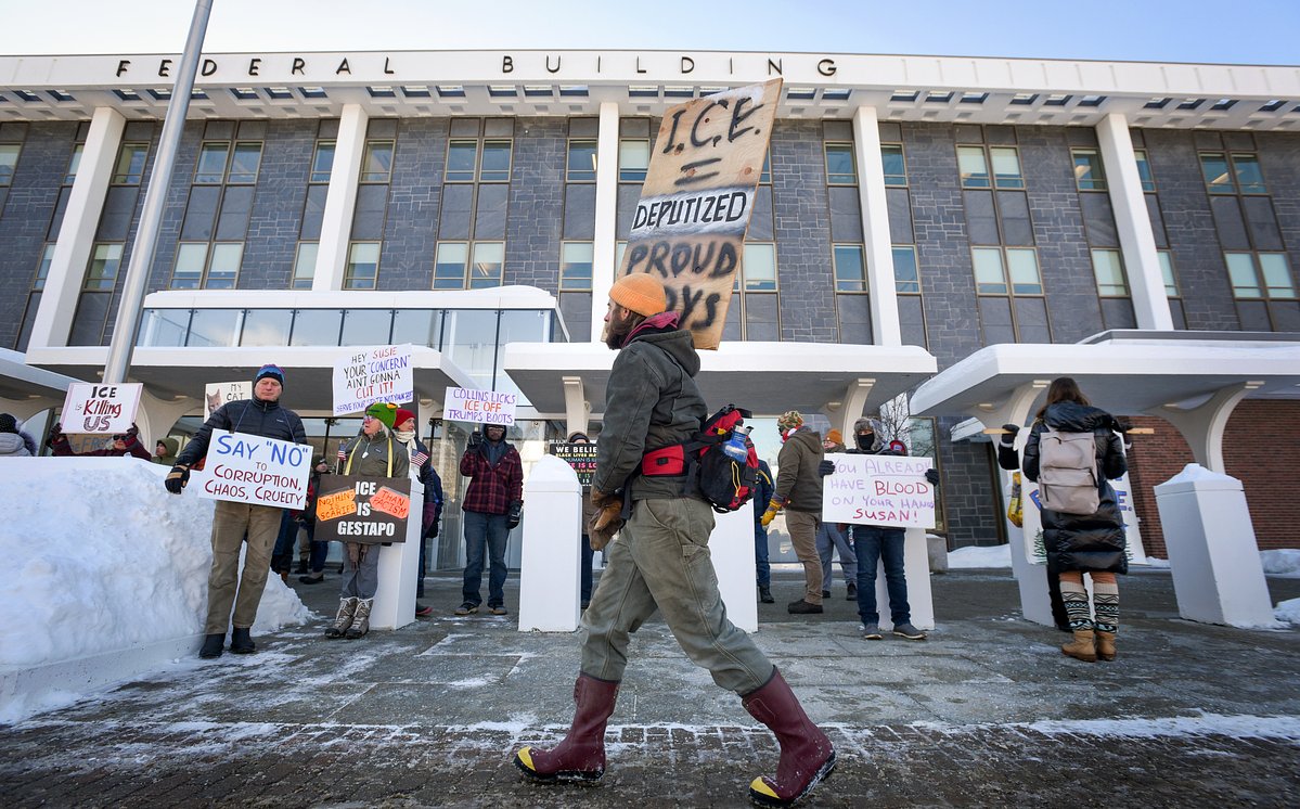 Dozens gather outside Susan Collins’ Bangor office to protest ICE funding