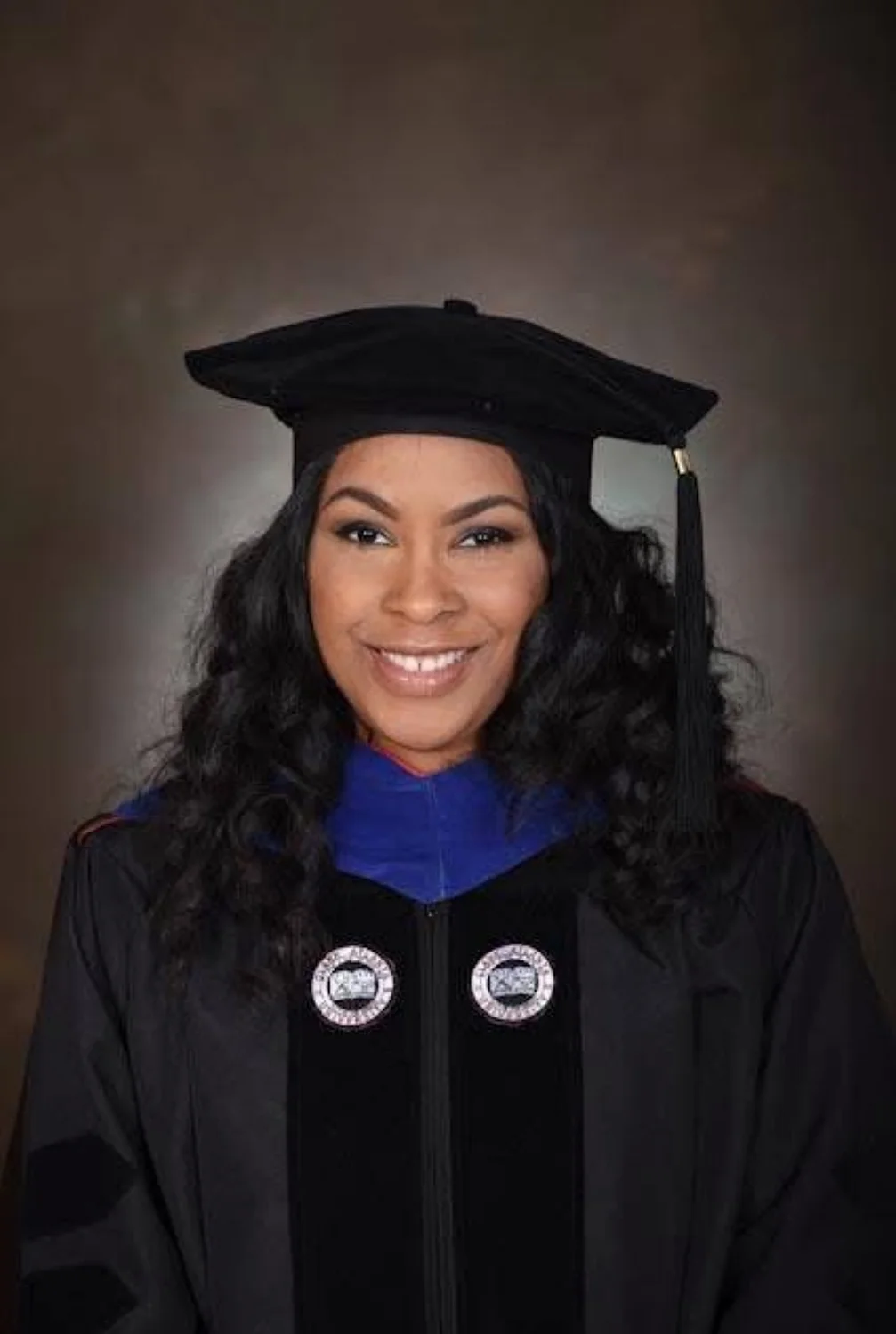 Man charged with murder in the death of LA-area technical college dean