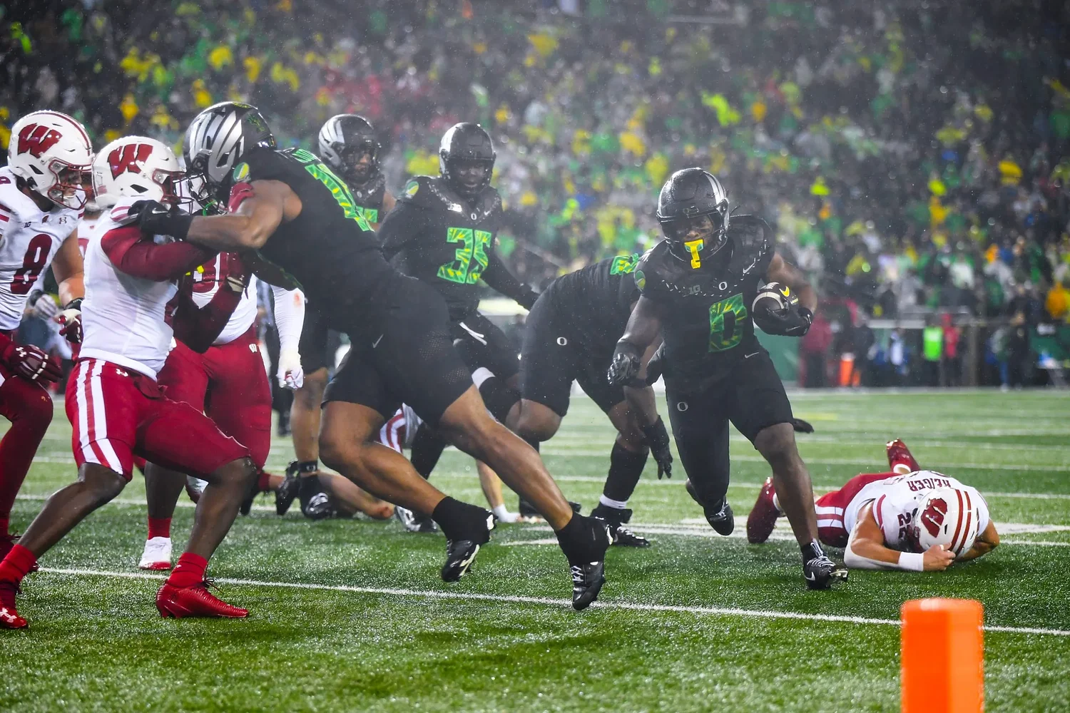 Moore bloodied as unexpected duo help Ducks survive Wisconsin