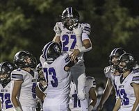 Downers Grove North’s Kevin Jay steps in at QB, helps lead blowout of Downers Grove South