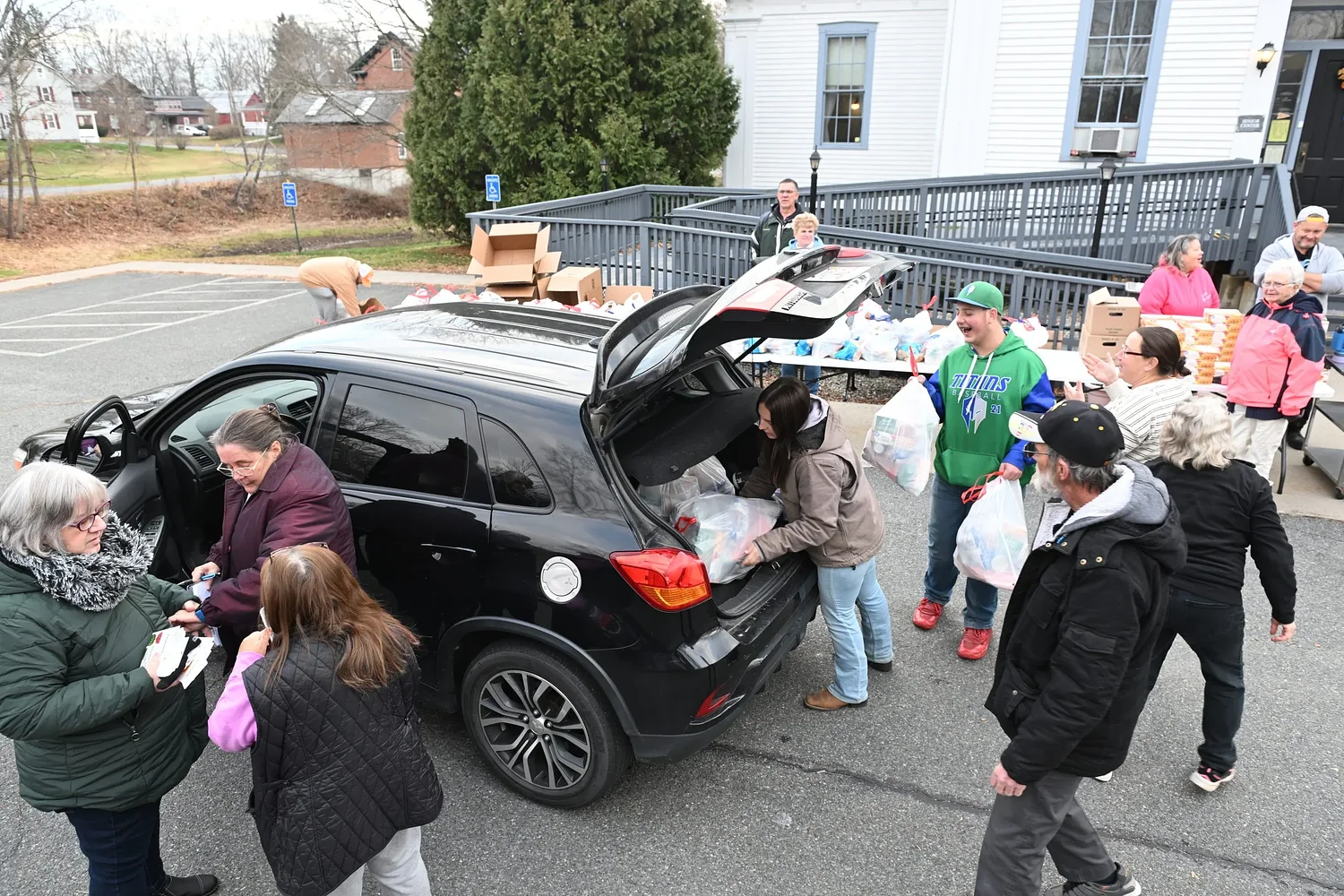 Volunteers continue Bobby C’s Thanksgiving meals distribution in 10th year