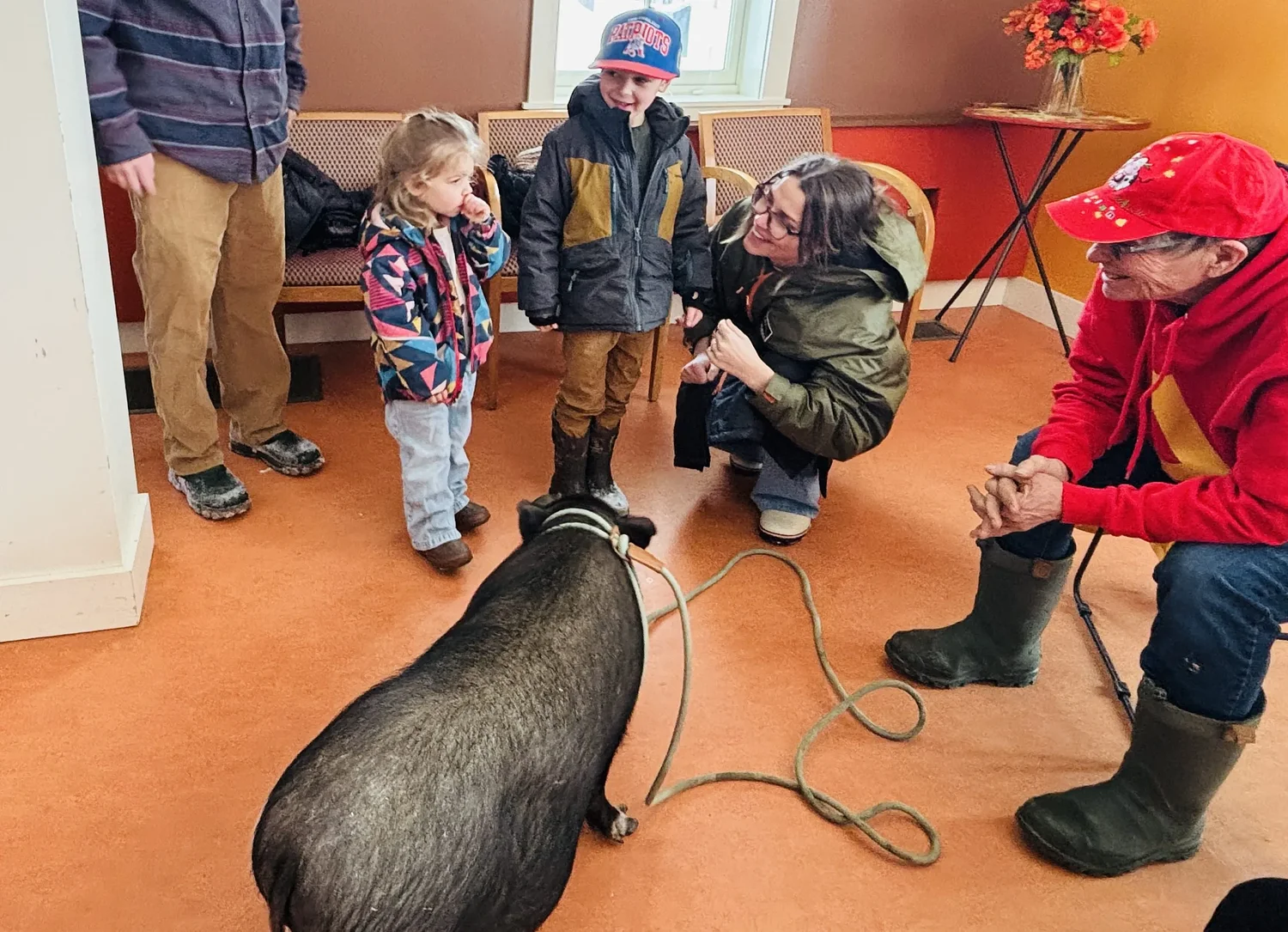 Archie the Pig brings joy to Dublin Community Center's Valentine event