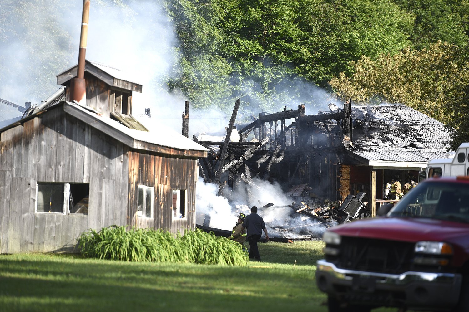 Post Mills barn fire threatens home, prompts three-alarm response