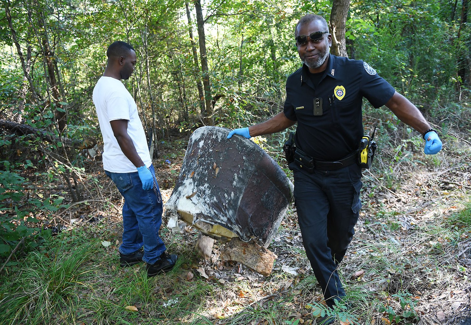 These JPD officers spend their days cleaning up illegal dump sites across Jackson