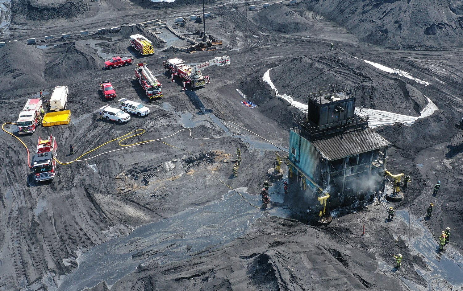 Two firefighters hospitalized after Hennepin Mill fire