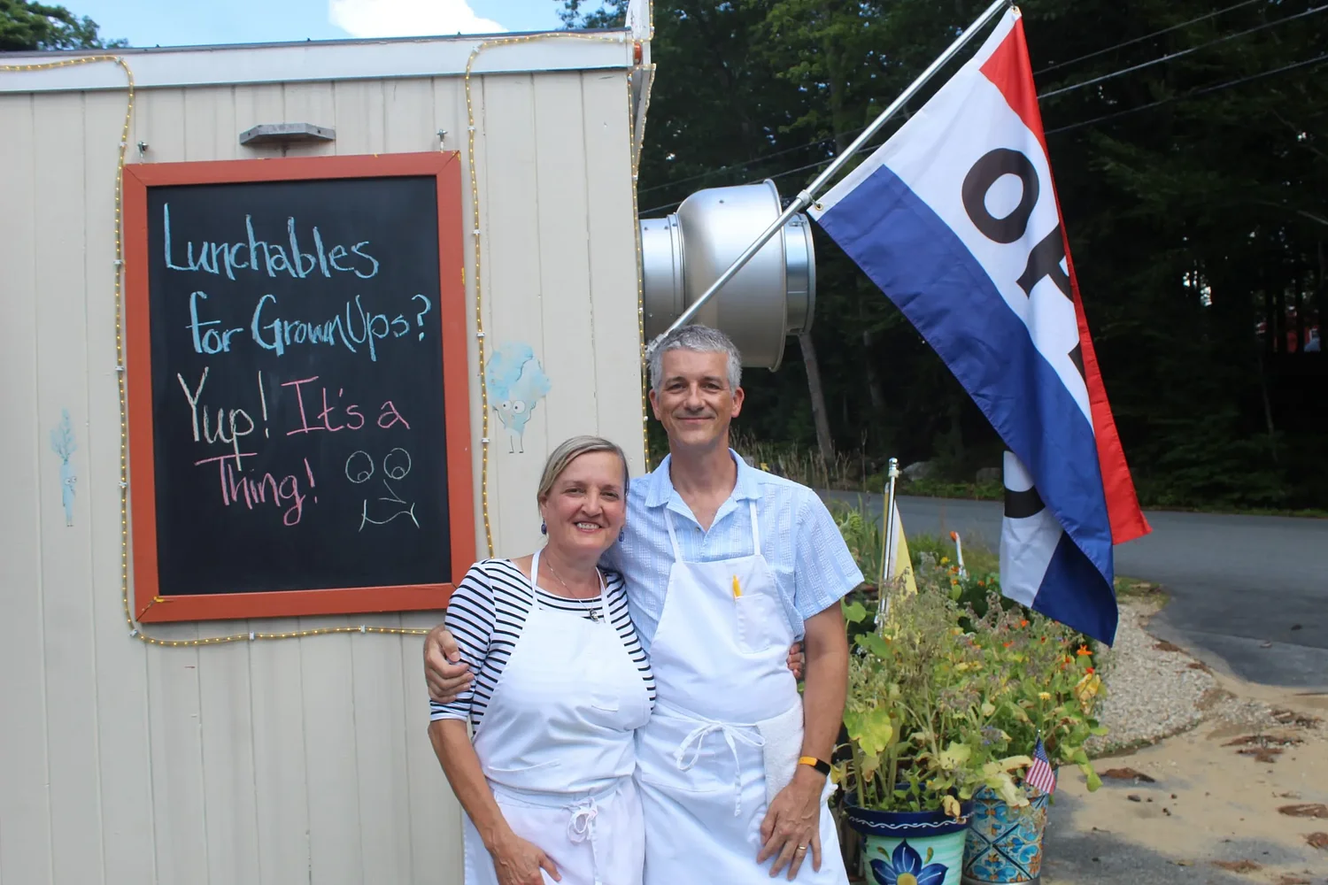 Husband and wife team up to serve gourmet meals from a food trailer
