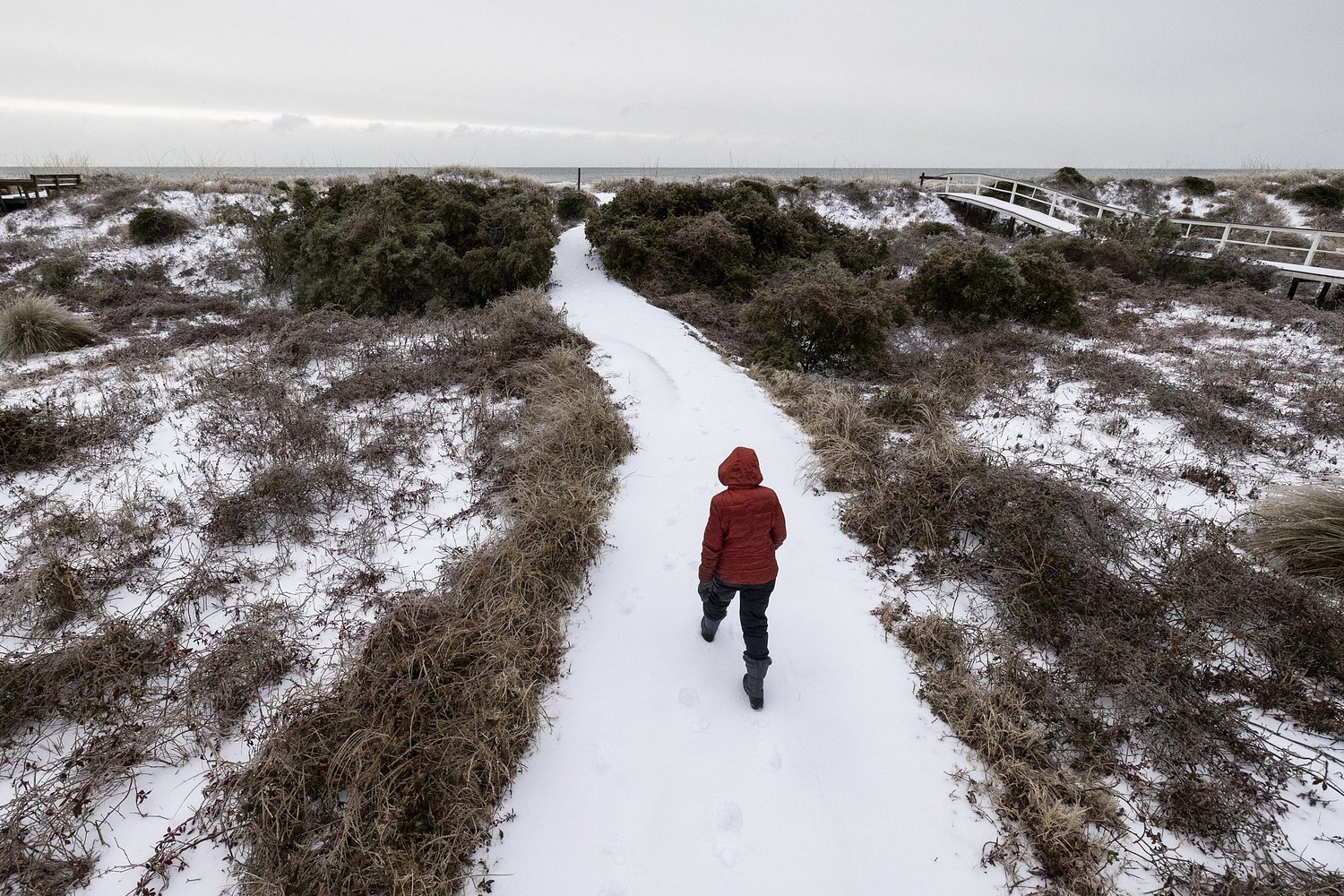 Winter storm that dropped record-breaking snow in New Orleans spreads into Florida and the Carolinas