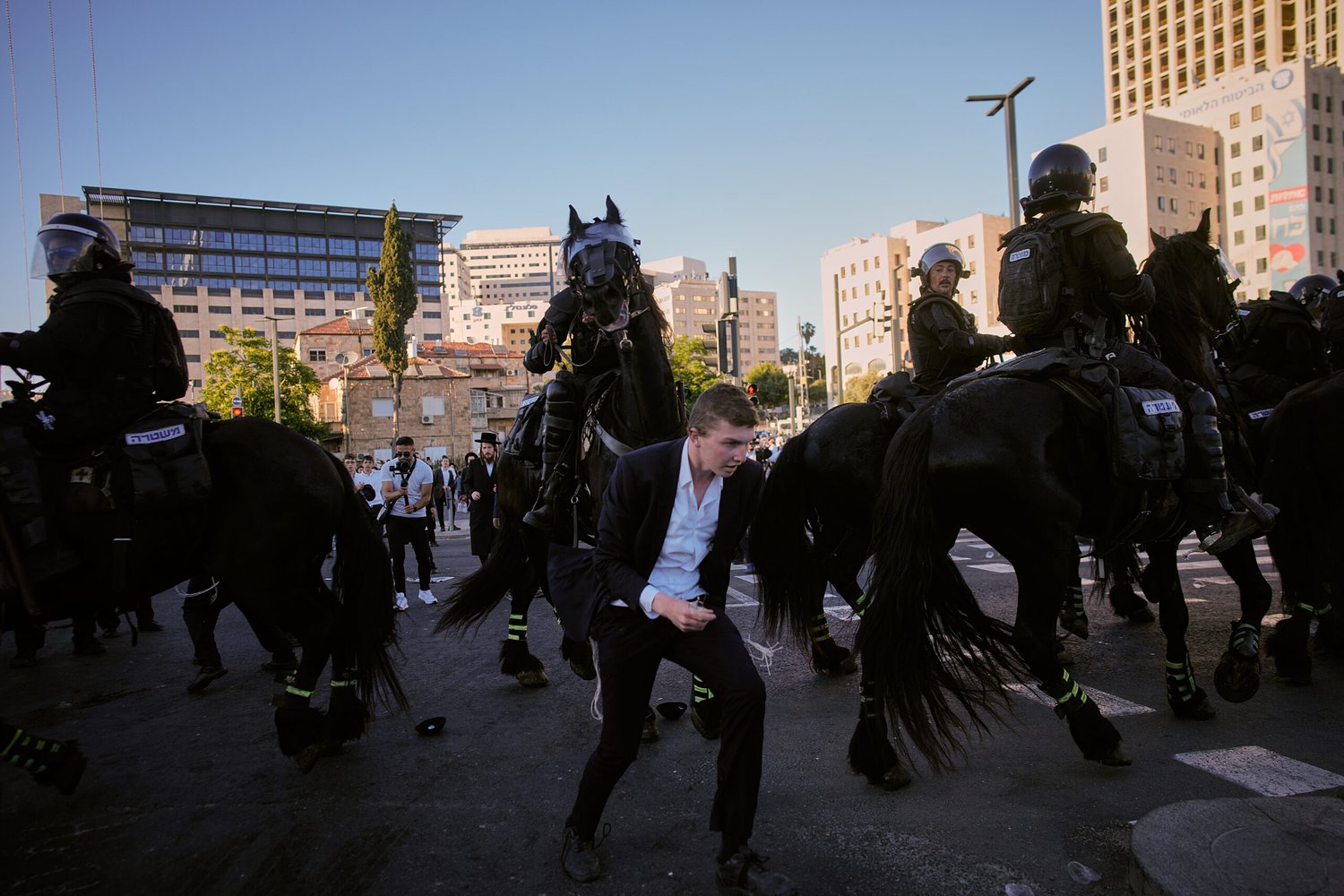 Ultra-Orthodox protesters block roads and trains across Israel over military draft