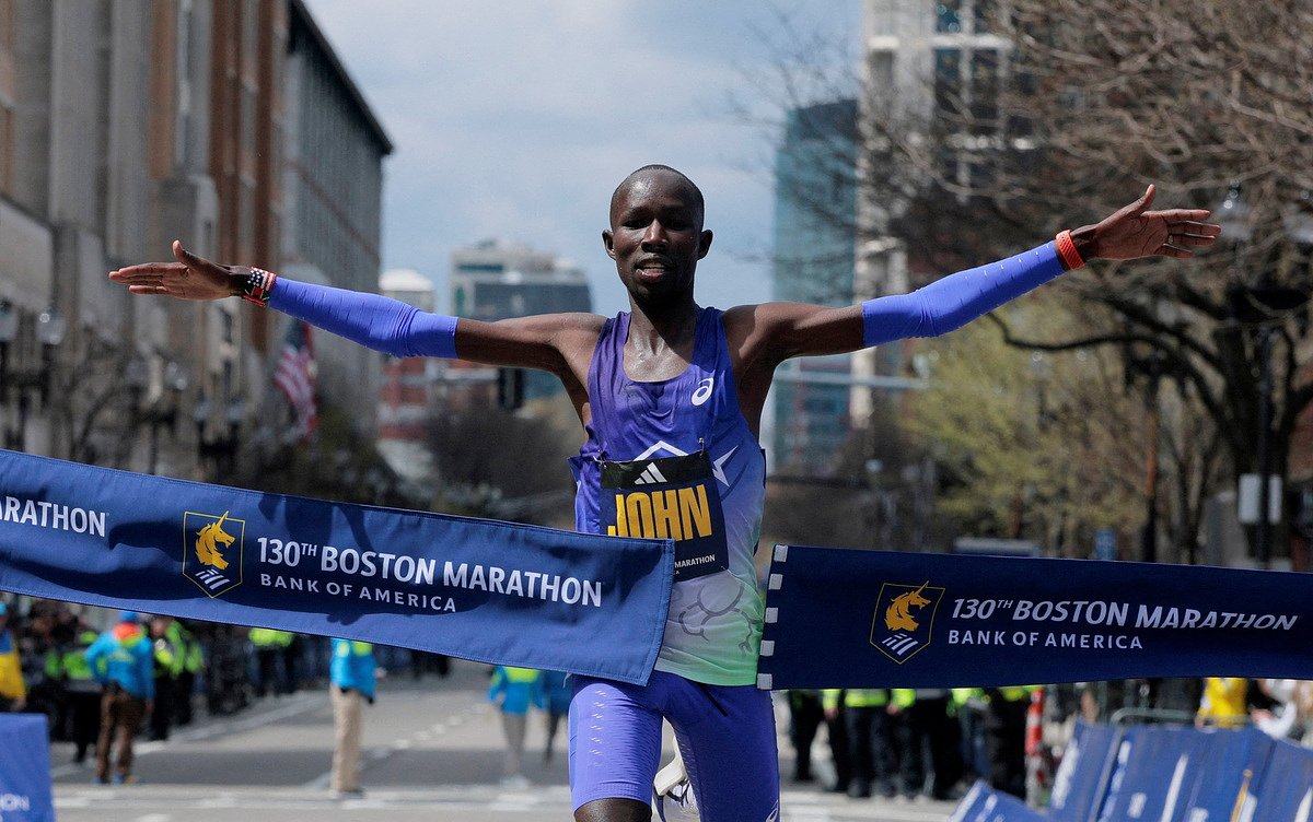 Defending men’s champion sets new Boston Marathon course record