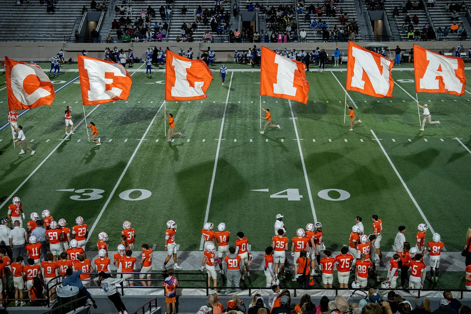 Abuse allegations against a legendary football coach's son fracture a North Texas town