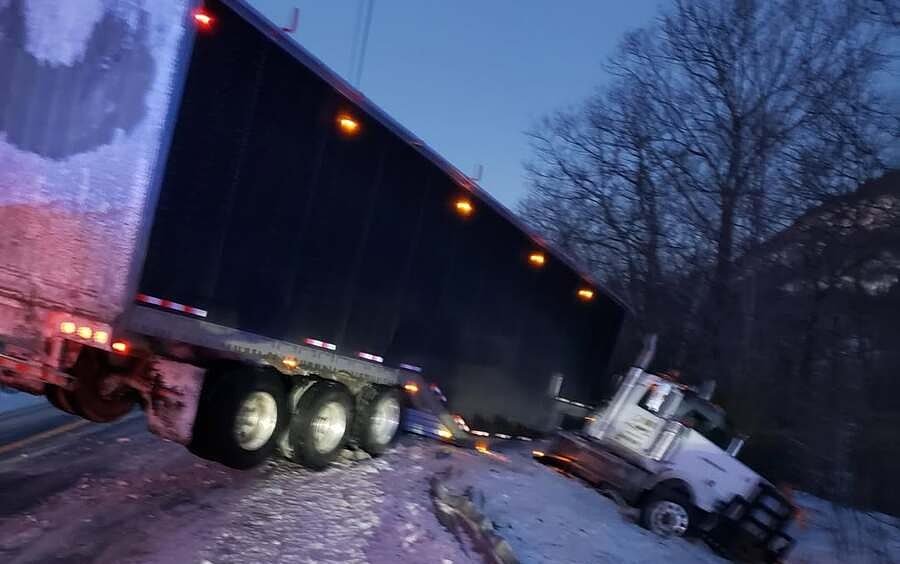 Tractor-trailer crashes after losing control on icy Maine road