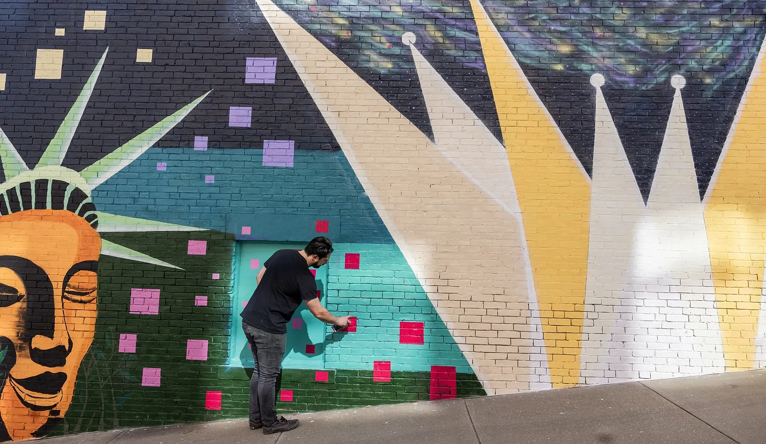 Local artist transforms Concord street with vibrant mural