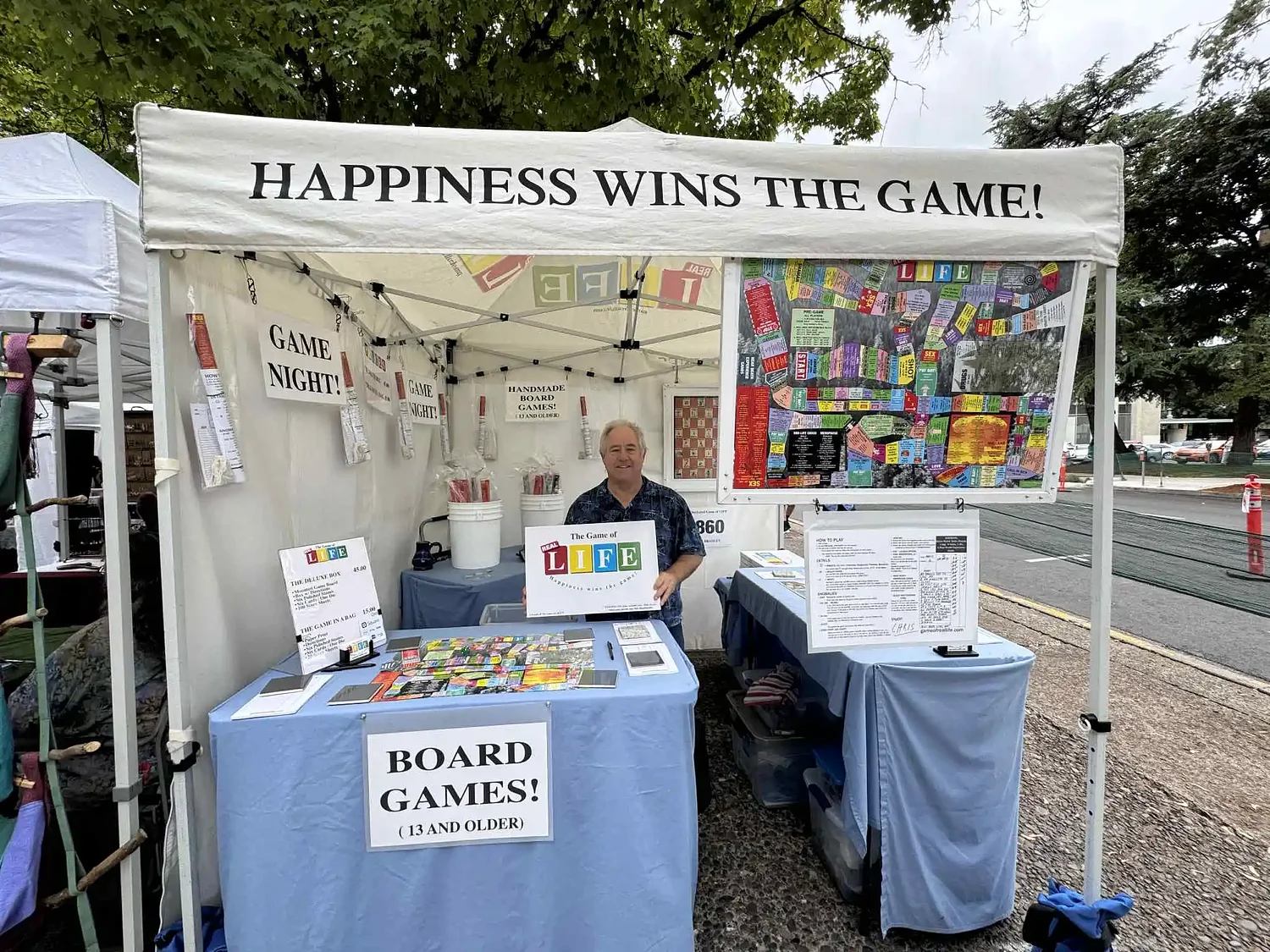 Game creator reinvents LIFE with a happiness-first twist at Saturday Market