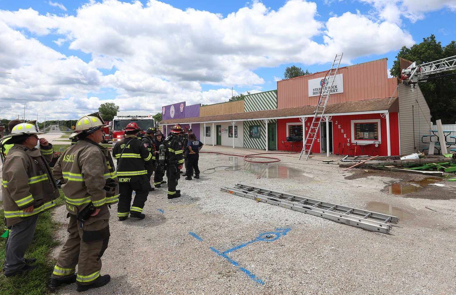 Fire companies battle blaze at Utica strip mall