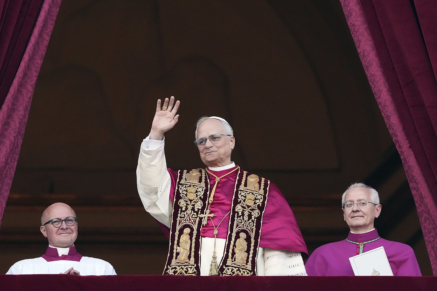 As a year of two popes ends, Catholics and the world watch as Leo takes charge