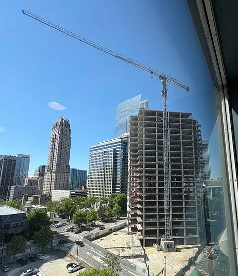 Crane safety and responsibility questioned at Midtown building site