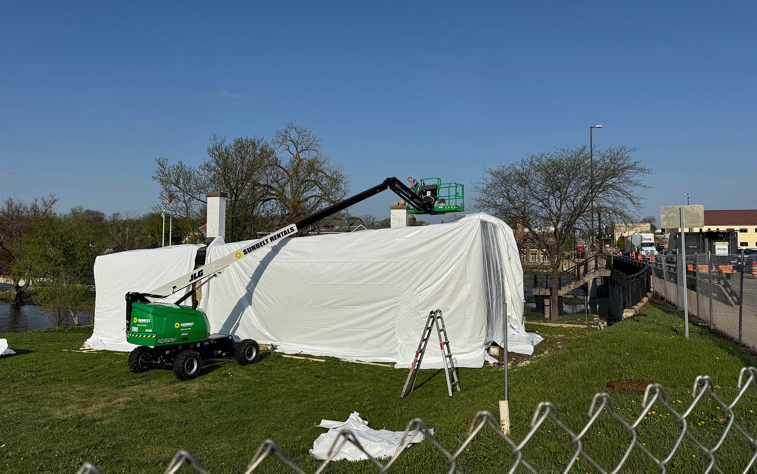 Geneva’s historic blacksmith shop gets covered in plastic - city gives 10 days to take it down