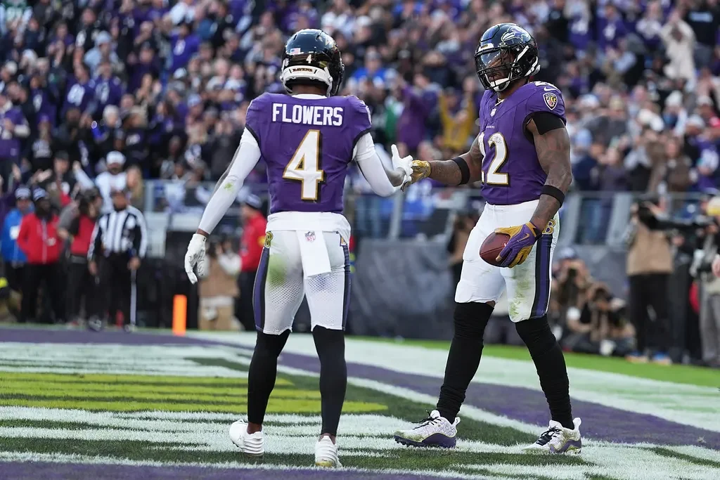 Henry rushes for 2 TDs to help sluggish Ravens to fifth straight win, 23-10 over Jets