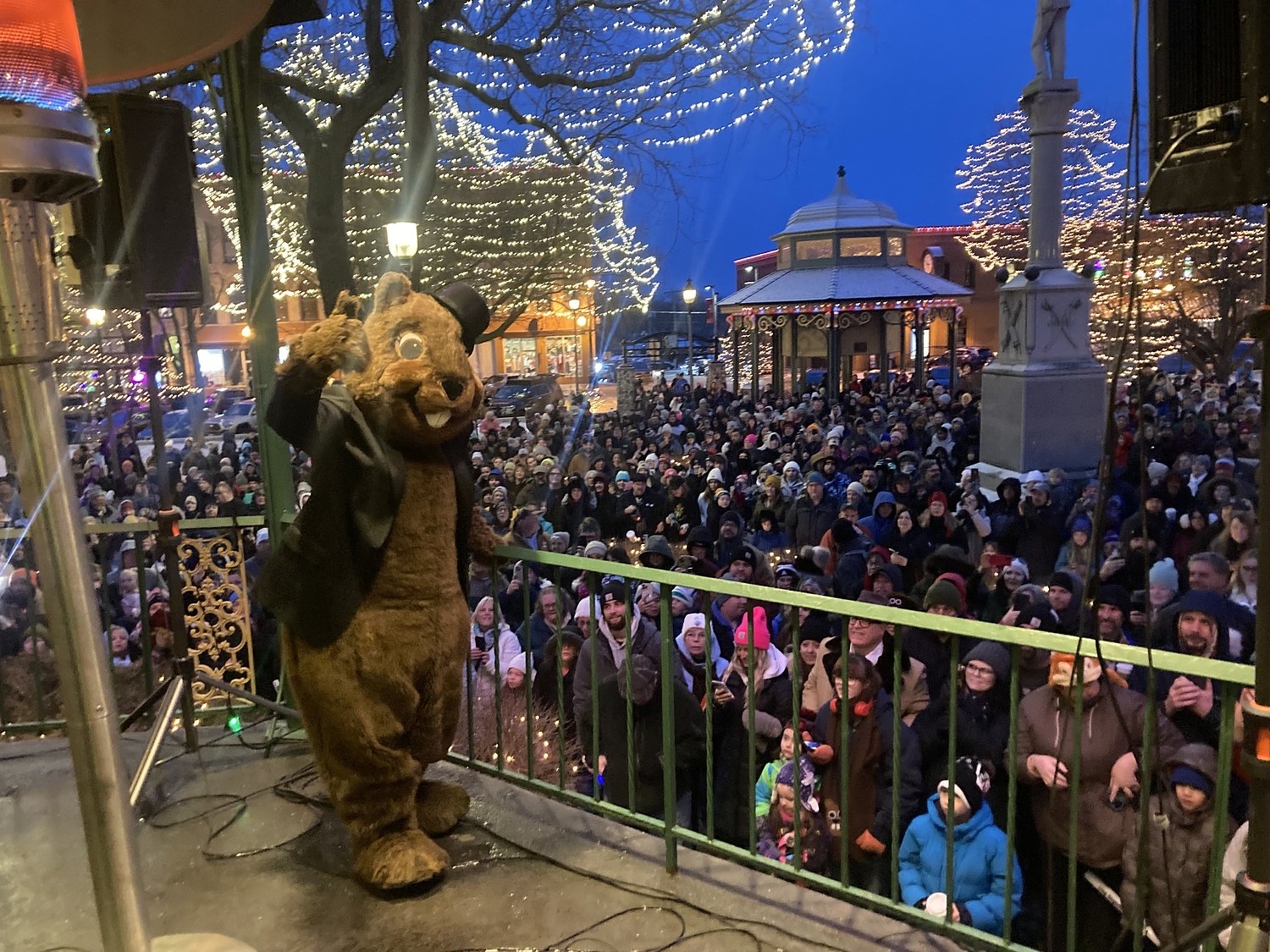 Woodstock Willie predicts an early spring in front of thousands gathered on the Square for Groundhog Day