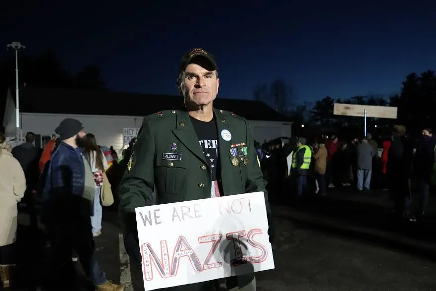 'I can't just sit by': Protestors gather in Merrimack to oppose potential ICE facility