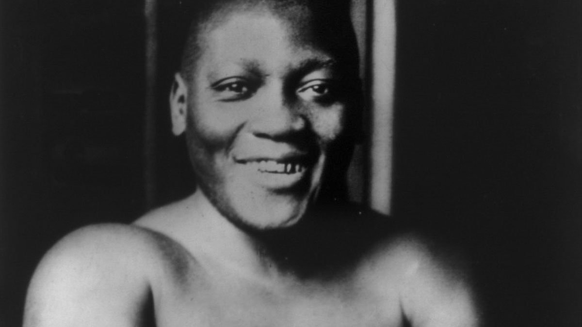 1908: Jack Johnson becomes first Black heavyweight boxing champion