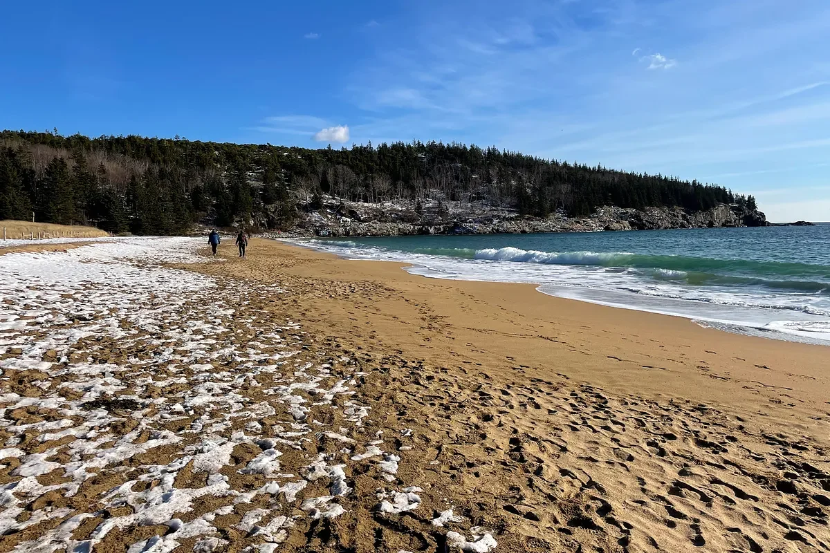 This Acadia winter adventure includes a sand beach and crumbling tea house