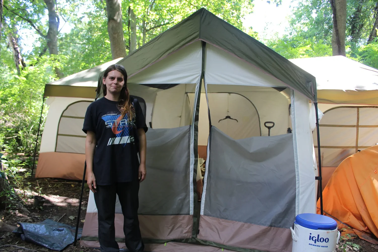 Volunteers aid cleanup at flooded homeless encampment in Greenfield