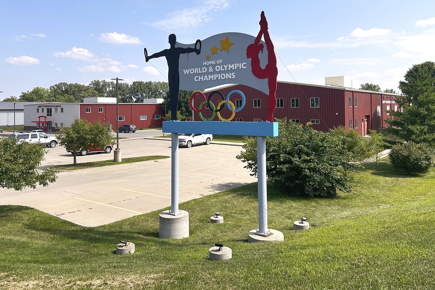 FBI arrests ex-coach of elite gymnastics in Iowa on child porn charge from Mississippi