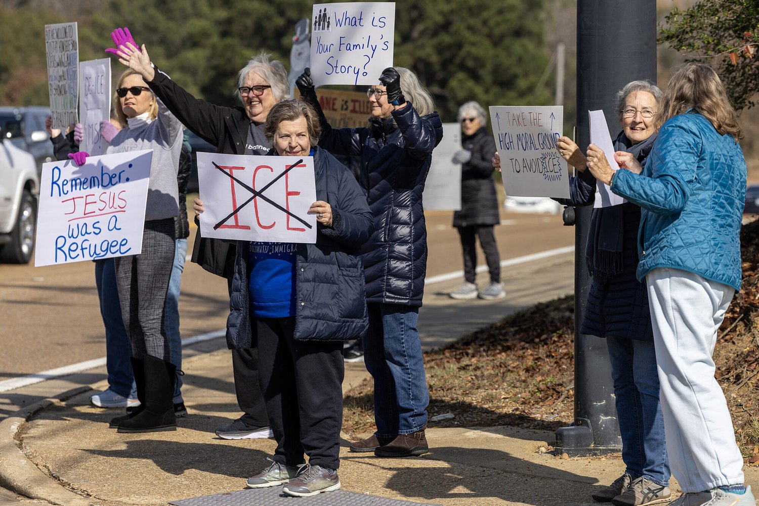 People protest Deep South immigration crackdown as Gov. Reeves speaks at Madison restaurant