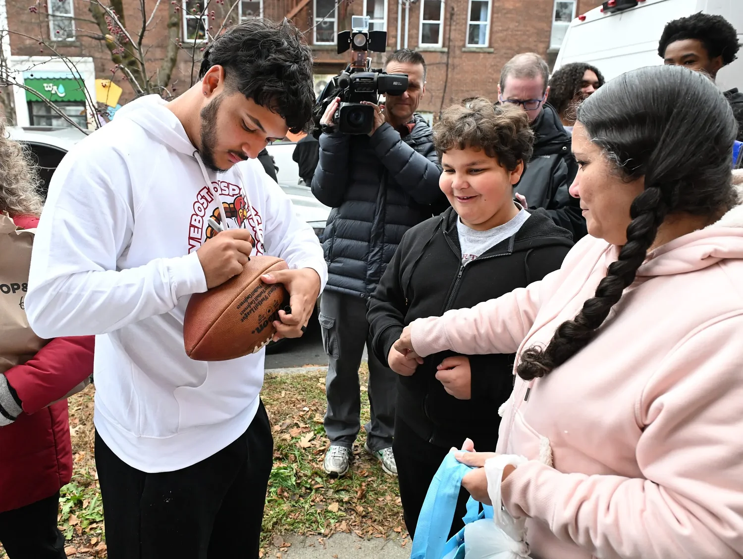 A community gift: Heartwing Center and Patriots’ Borregales team up for turkey giveaway