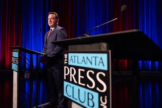 Burt Jones takes shots at absent rival on the debate stage as Rick Jackson hits the campaign trail