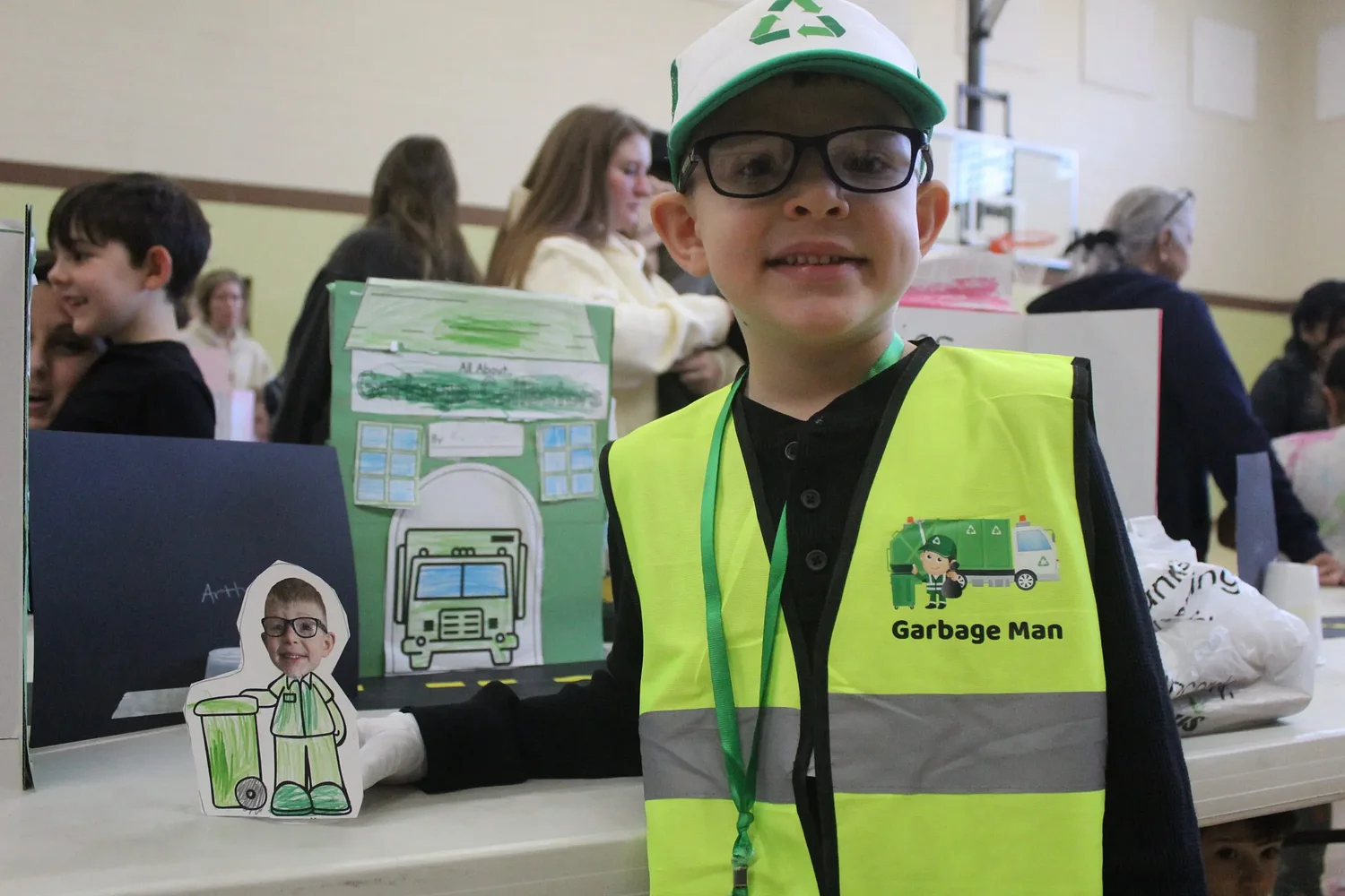 First graders explore community roles through interviews and presentations