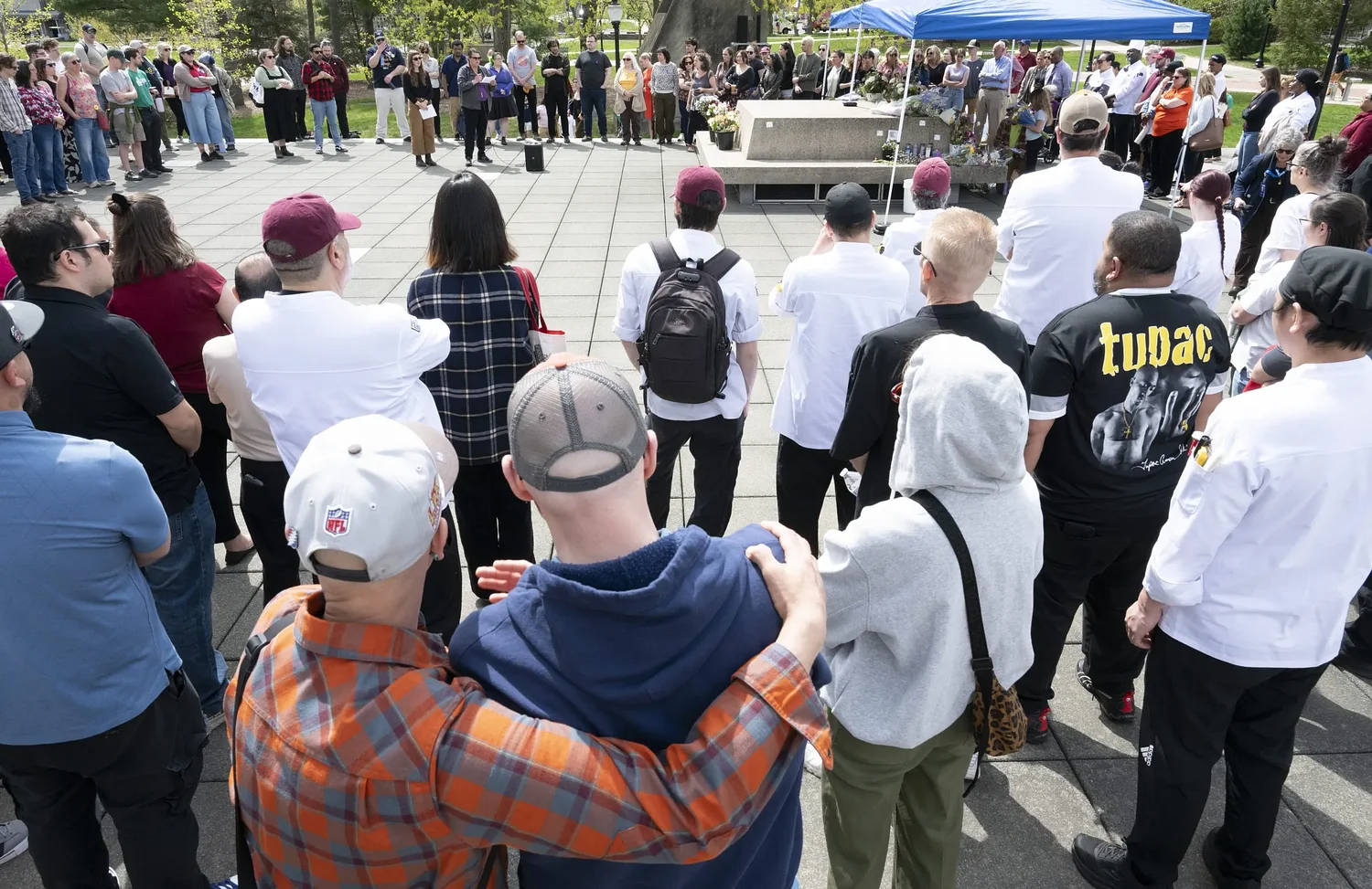 In silence and tears, a community remembers slain UMass worker at vigil