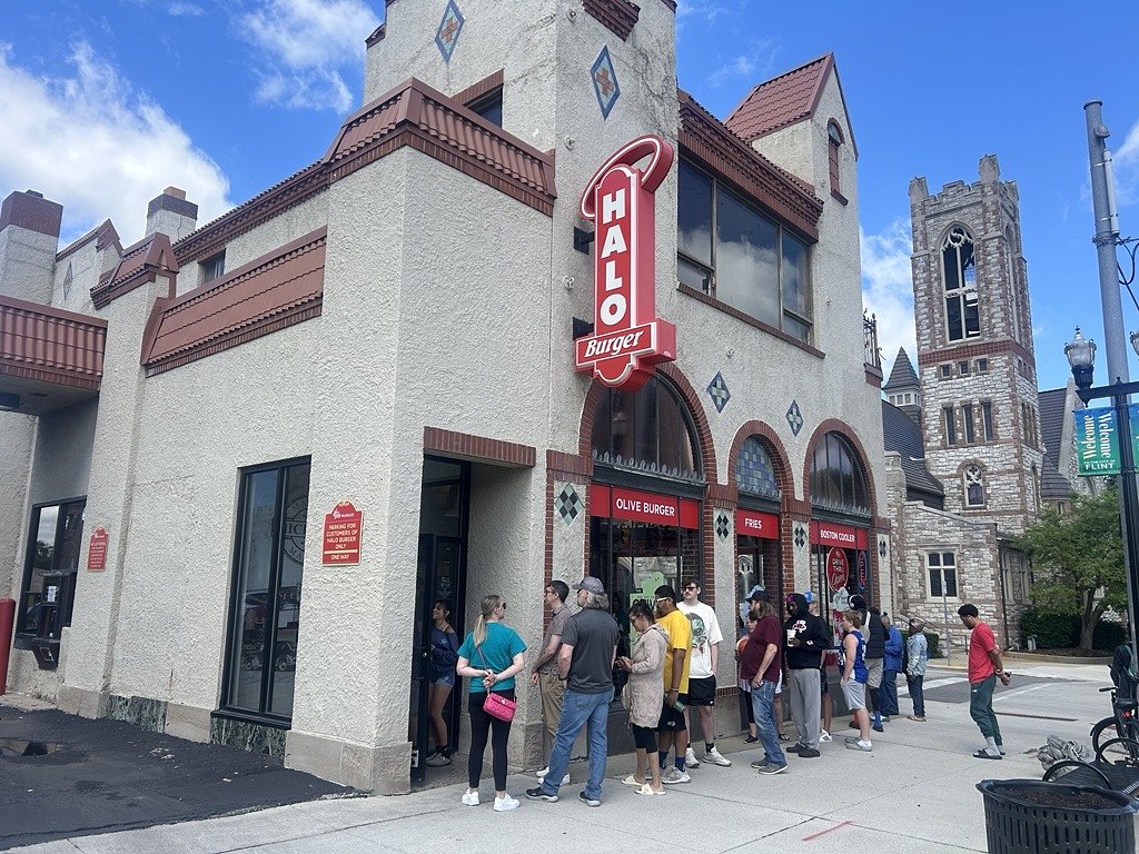 Former Detroit Pistons guard Malik Beasley draws crowd at Flint Halo Burger event
