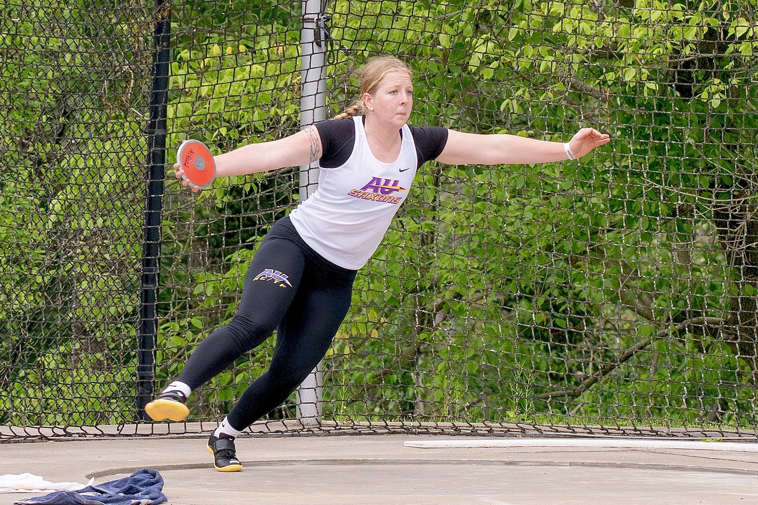 From ice to field: Woodstock alum Bremel sets discus record at Alfred University