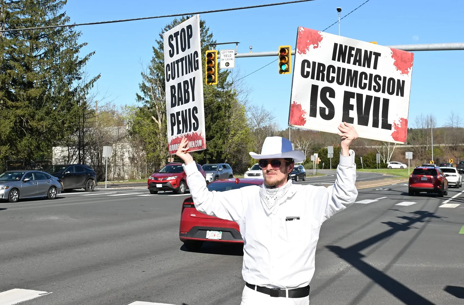 'A horrible human rights violation': Bloodstained Men bring anti-circumcision protest to Greenfield