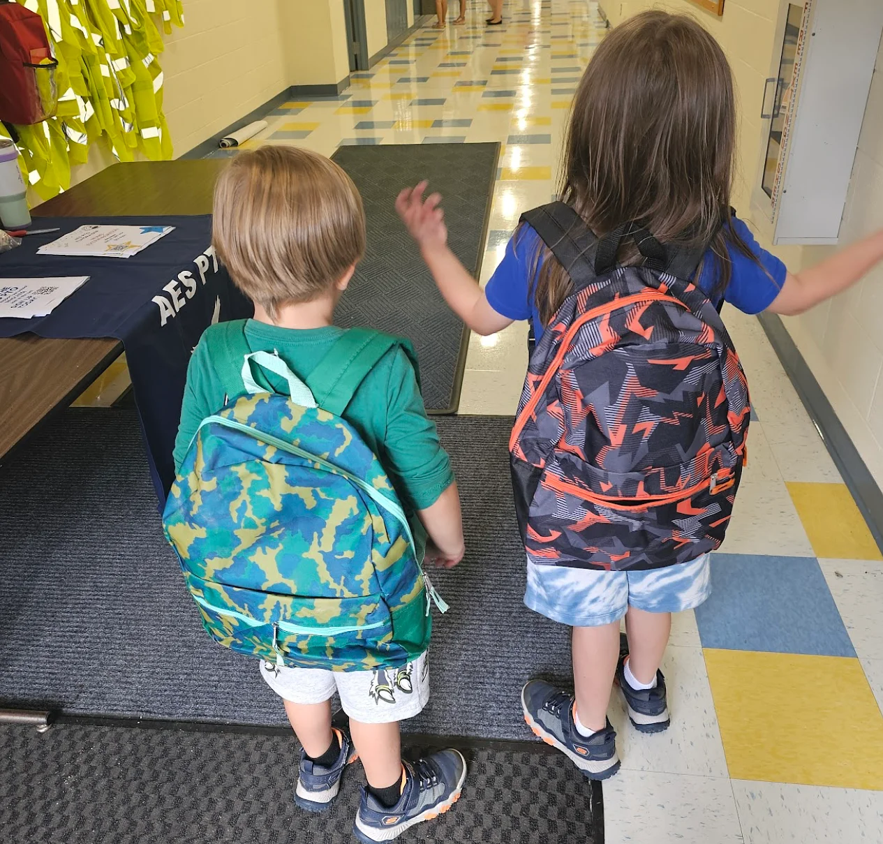 Rotary Passport Club donates 150 backpacks to Antrim Elementary