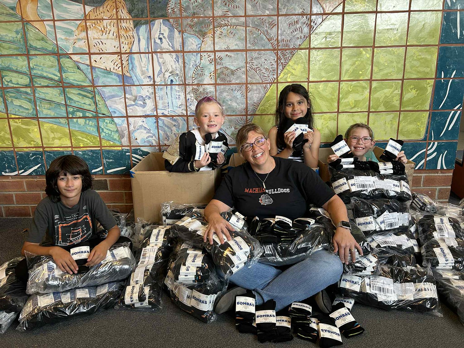 Company sends 1,000 pairs of socks to Machias Area school