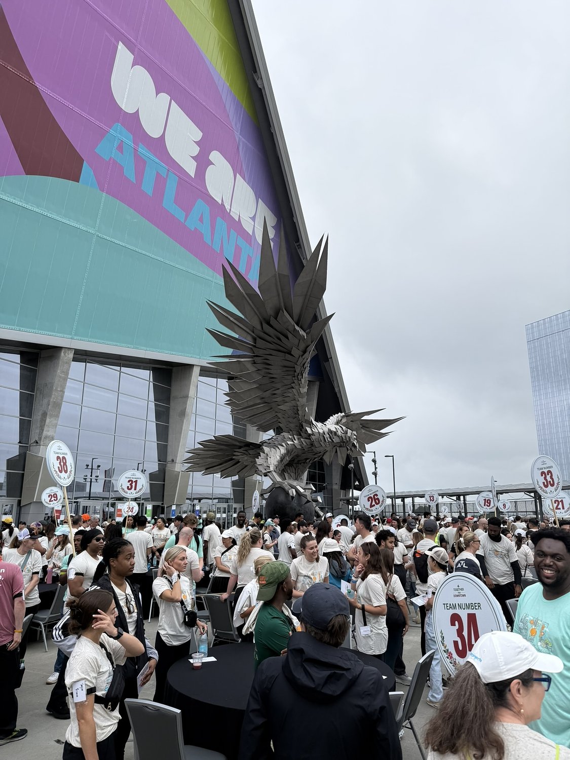 Volunteers work to beautify Downtown Atlanta ahead of FIFA World Cup