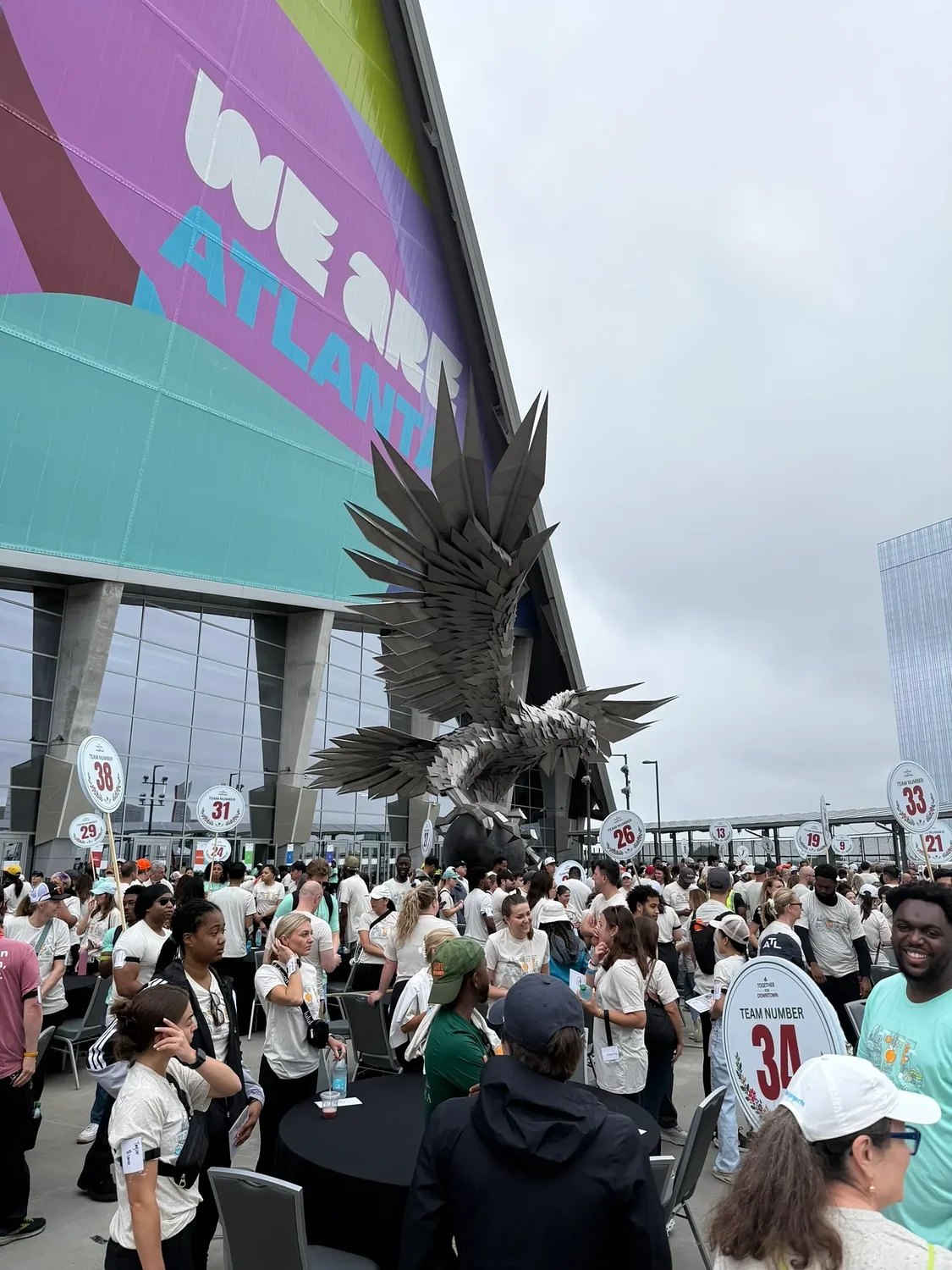 Volunteers work to beautify Downtown Atlanta ahead of FIFA World Cup