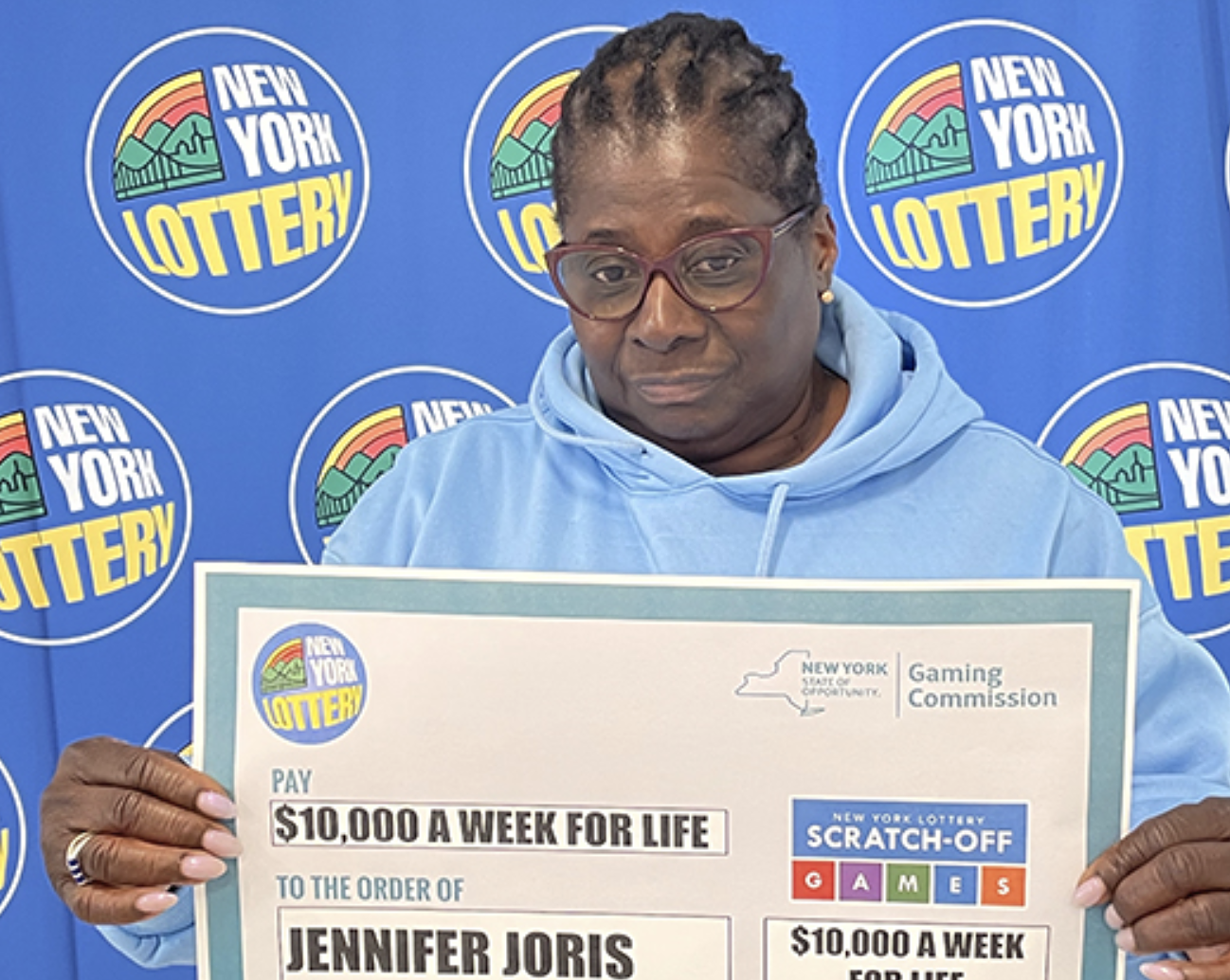 New York woman wins $10,000 a week for life from lottery scratch-off game, opts for $10 million payout