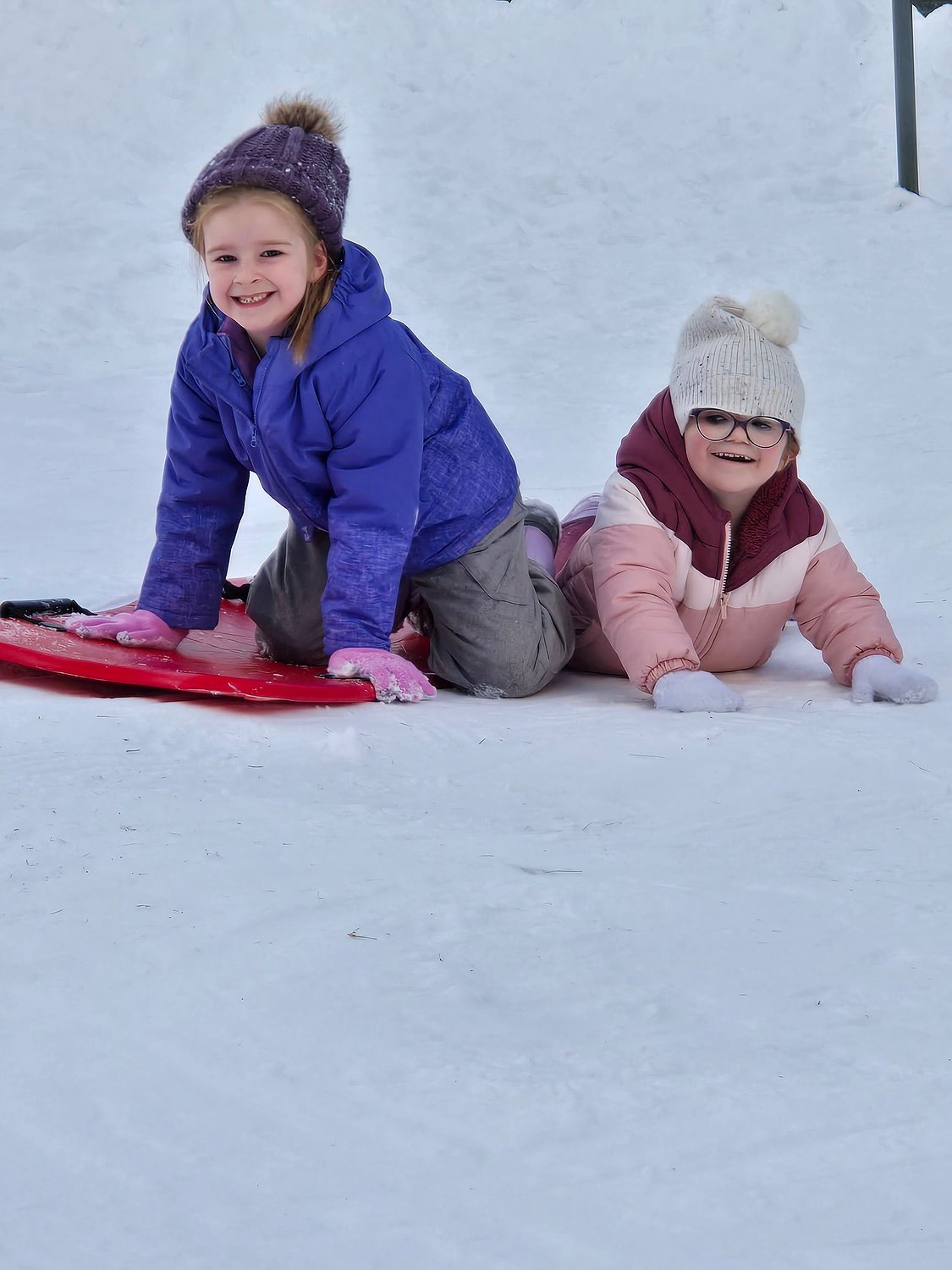 Rindge Extended Day Program kids have fun sledding outdoors