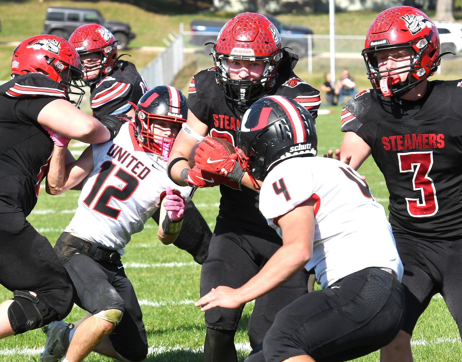 Fulton football rolls to a record-setting 70-15 win over Monmouth United in the Class 1A opening round
