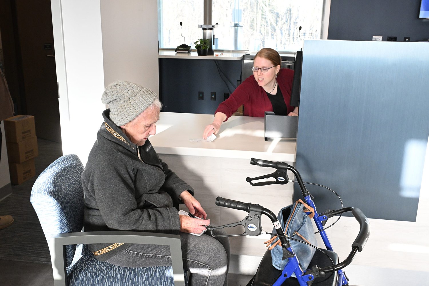 Keeping tradition: Northfield bank's first customer retains status upon post-renovation reopening