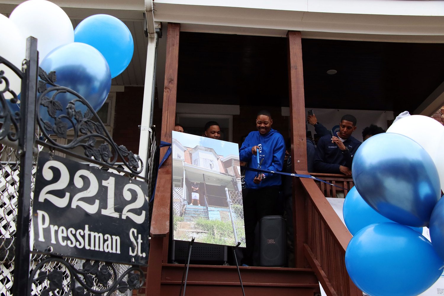Tired of walking by the vacant housing problem, students at Carver Vocational learned how to fix it
