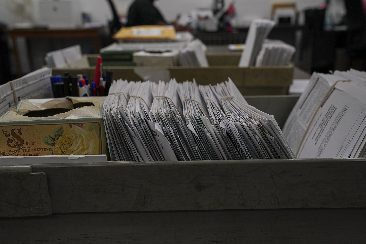 Local Texas election officials clear voter registration backlog caused by state error