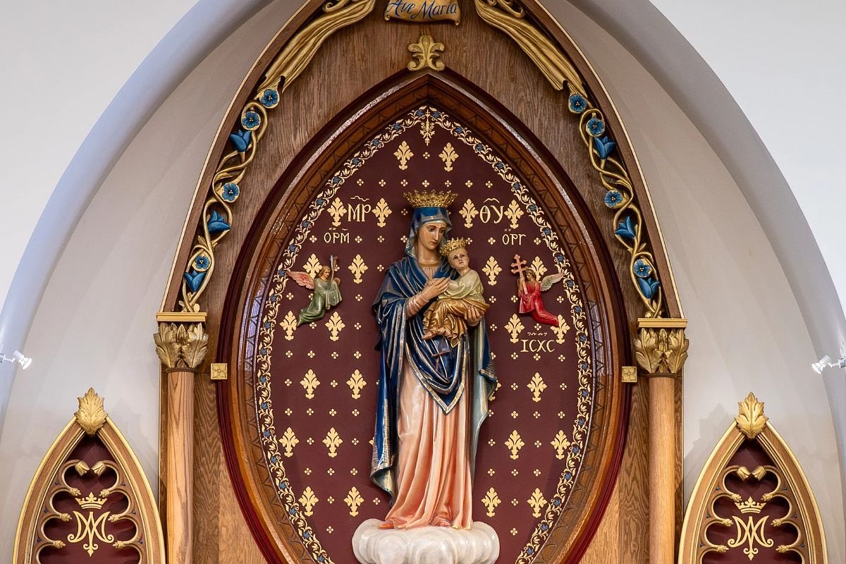 Lewiston’s revered Virgin Mary medallion finds a ‘proper’ home
