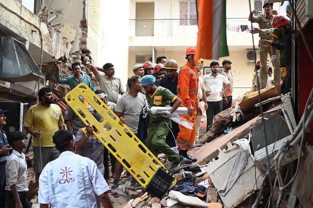 1 dead after New Delhi building collapses, trapping dozens