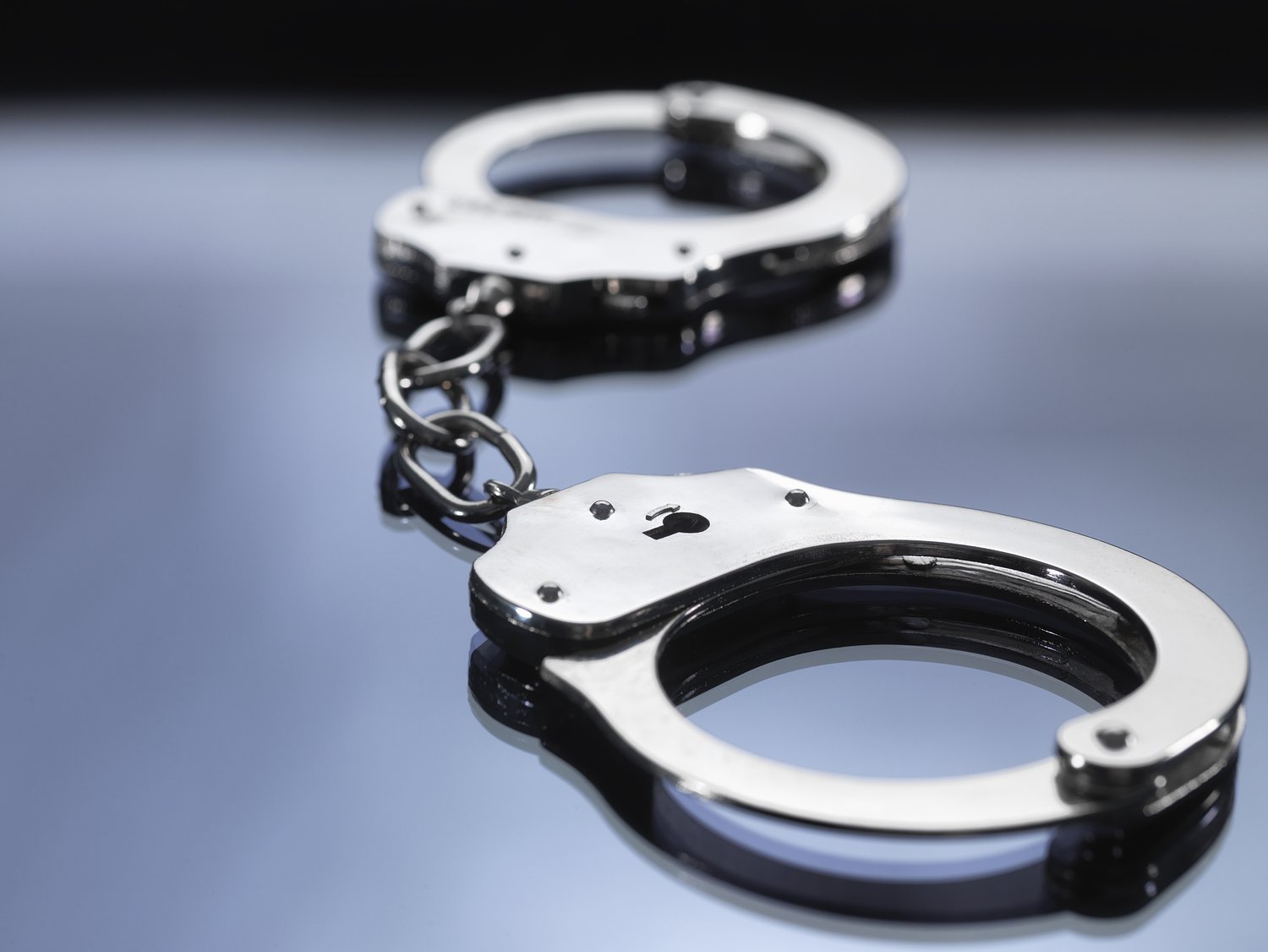 Suspect in deaths of 2 women pulled from fire surrenders to police
